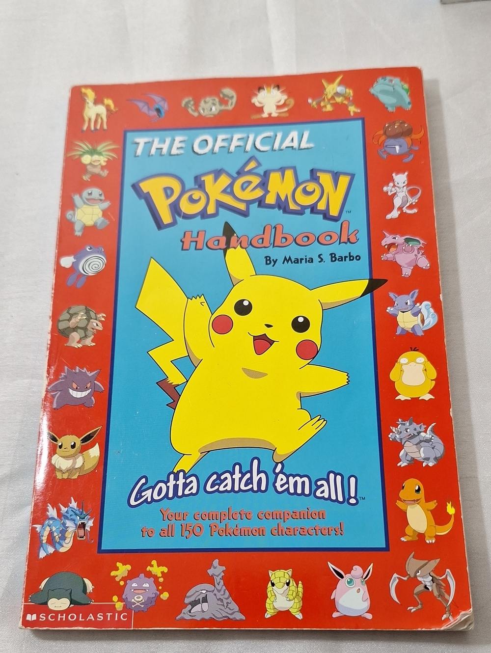 Scholastic Pokemon Official Handbook by Maria S. Barbo - Red & Blue Cover